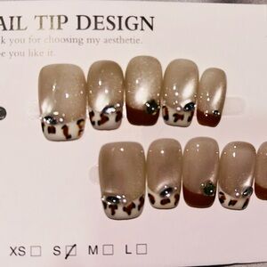 Elegant Beige Nail Tips with Leopard Design